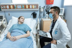 A doctor explaining to a woman what happens to her body after an abortion.